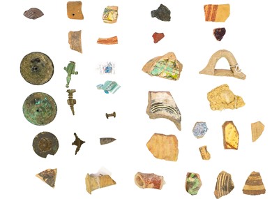 Lot 38 - A group of Cypriot pottery shards and glass fragments.