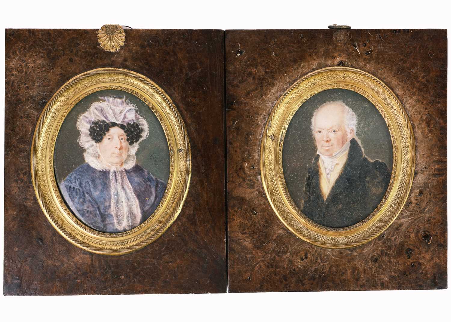 Lot 265 - A pair of 19th century oval portrait miniatures of Mr and Mrs Samuel Hawkins.