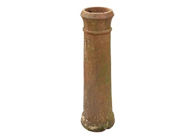 Lot 1571 - A tall terracotta chimney pot.