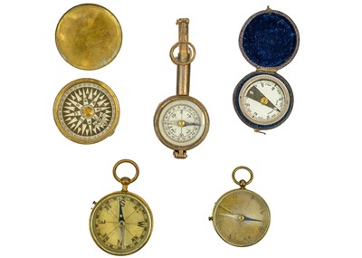 Lot 296 - A collection of five compasses.