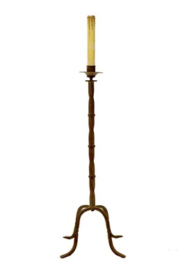 Lot 480 - A wrought iron candle stand.