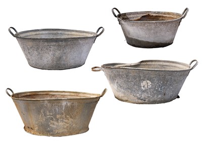 Lot 537 - Four galvanised tin baths.