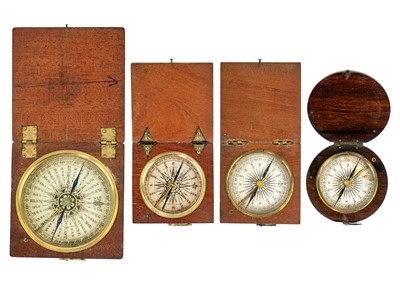 Lot 311 - A 19th century travel compass with printed card dial in a square oak case.