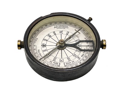 Lot 320 - A brass dip needle compass.