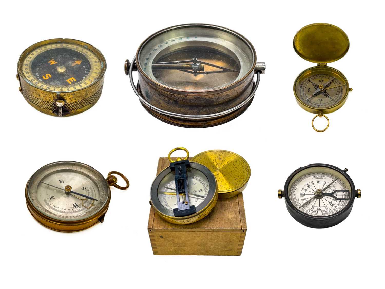 Lot 320 - A brass dip needle compass.