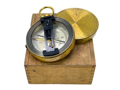 Lot 320 - A brass dip needle compass.