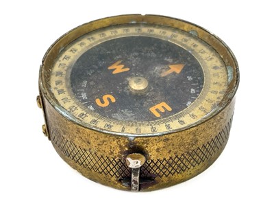 Lot 320 - A brass dip needle compass.