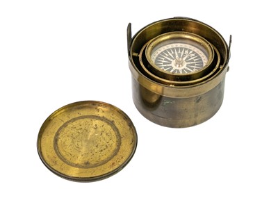 Lot 298 - A 19th century brass gimbal mounted pocket compass.