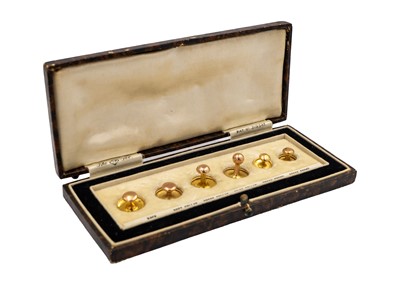 Lot 87 - A 9ct cased set of six dress shirt studs inscribed 'The OP set'.