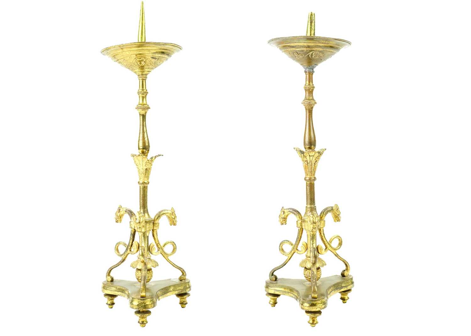 Lot 52 - A pair of brass pricket type ecclesiastical candlesticks.