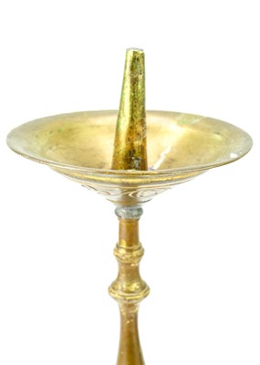 Lot 52 - A pair of brass pricket type ecclesiastical candlesticks.