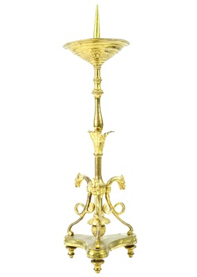 Lot 52 - A pair of brass pricket type ecclesiastical candlesticks.