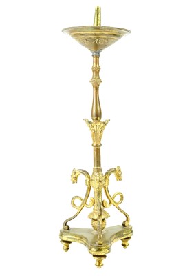 Lot 52 - A pair of brass pricket type ecclesiastical candlesticks.