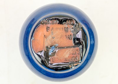 Lot 359 - A small Barum Ware Arts and Crafts vase retailed by Liberty.