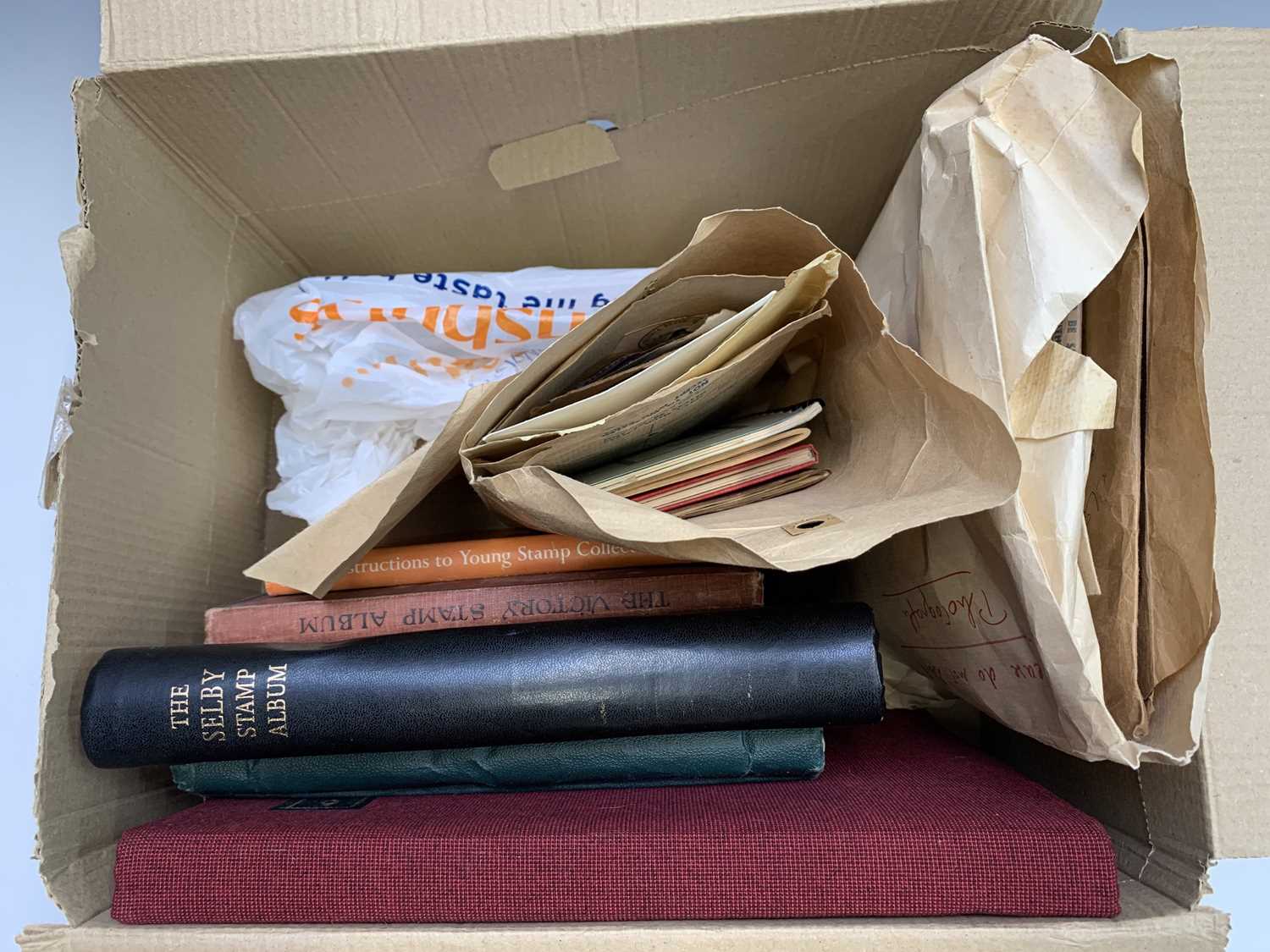 Lot 340 Stamps A Box of stamps contained 4 well