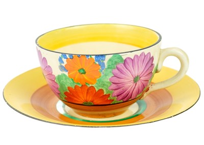 Lot 420 - A Clarice Cliff Gay Day pattern tea cup and saucer.