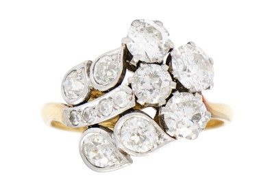 Lot 228 - An exquisite Art Deco 18ct gold and platinum diamond set floral design ring.