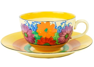 Lot 142 - A Clarice Cliff Gay Day pattern tea cup and saucer.