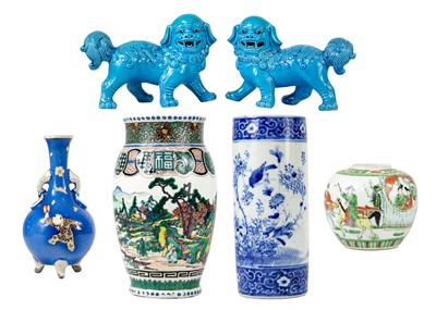 Lot 1110 - A pair of Chinese porcelain turquoise dogs of fo.