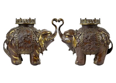 Lot 1109 - A pair of Chinese bronze elephant incense burners.