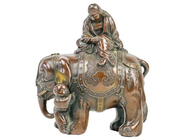 Lot 1111 - A Chinese bronze model of an elephant, early 20th century.