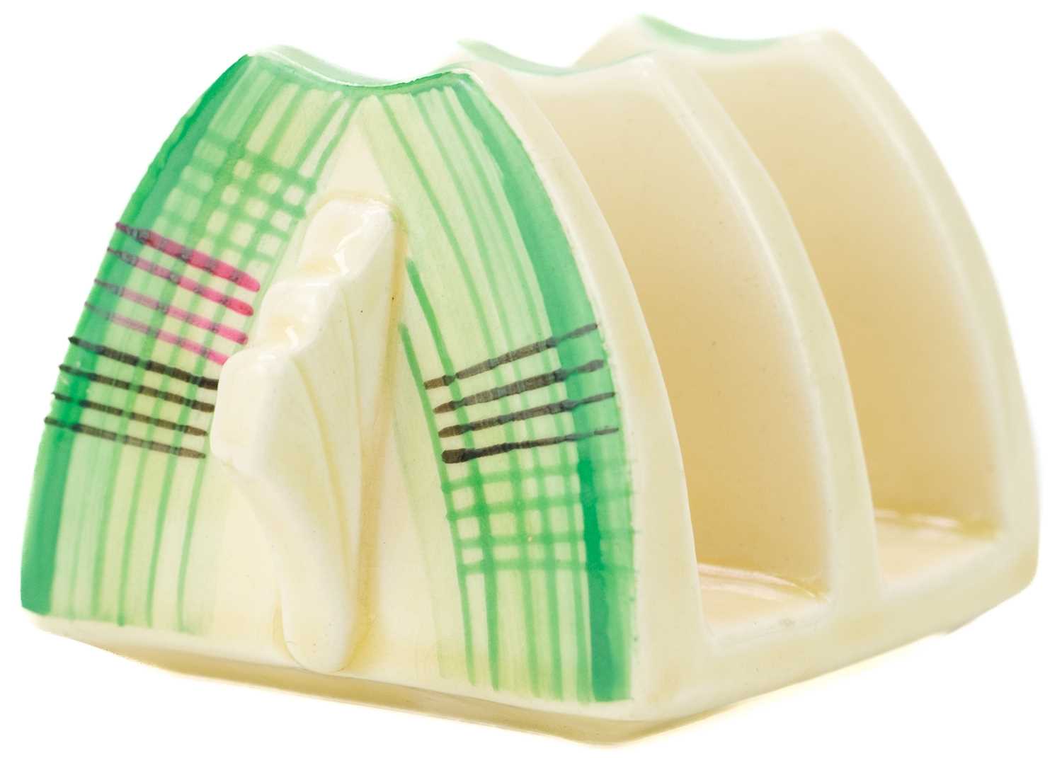 Lot 384 - A Clarice Cliff Tartan (green) pattern daffodil shape toast rack.