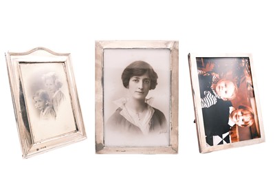 Lot 73 - Three silver mounted photograph frames.