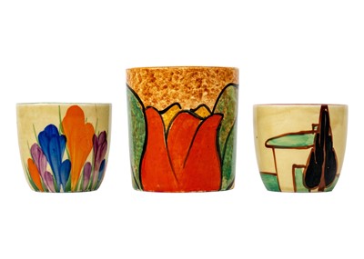 Lot 425 - A Clarice Cliff Red Trees & House pattern egg cup.