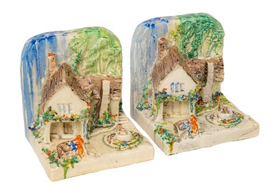 Lot 397 - A pair of Clarice Cliff cottage bookends shape 411.
