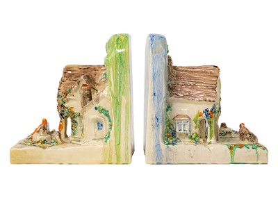 Lot 397 - A pair of Clarice Cliff cottage bookends shape 411.