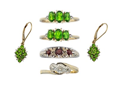 Lot 118 - Four gem set rings and a pair of gem-set pendant earrings.