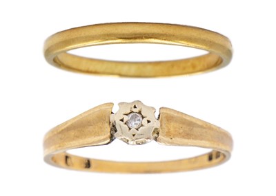 Lot 107 - An 18ct band ring and a 9ct diamond set solitaire ring.