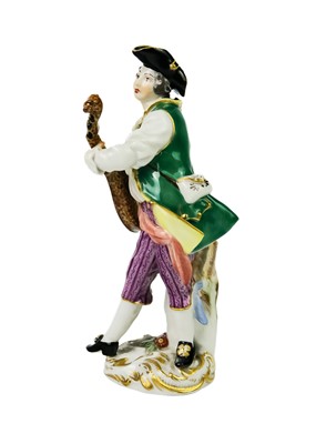 Lot 429 - A Meissen porcelain figure of a lute player.