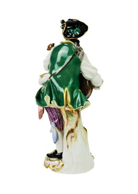 Lot 429 - A Meissen porcelain figure of a lute player.