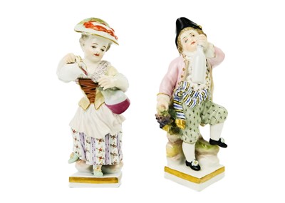 Lot 381 - A pair of Meissen porcelain figures of child vintners.