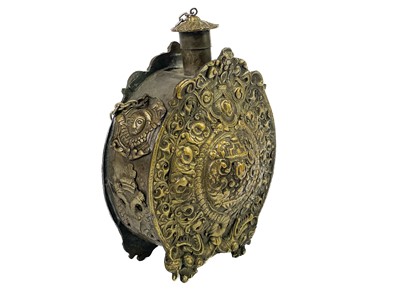 Lot 256 - A cast brass Russian powder flask and cover.