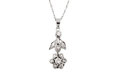 Lot 125 - A 14ct white gold diamond set flower pendant necklace.