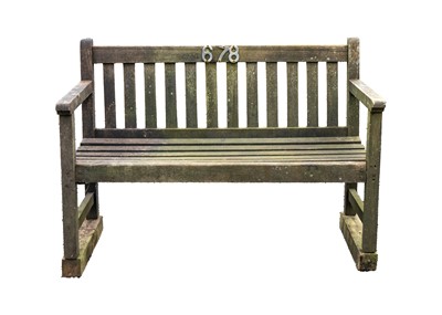 Lot 528 - A wooden garden bench.