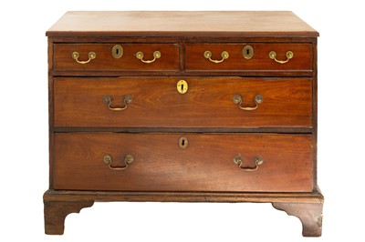 Lot 585 - A late George III mahogany chest.