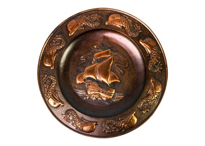 Lot 66 - An Arts and Crafts J & F Pool of Hayle copper charger.