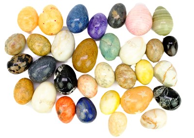 Lot 61 - A collection of egg-shaped minerals.