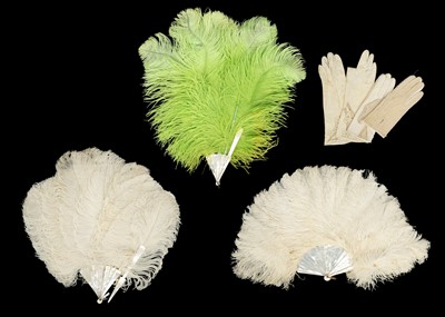 Lot 520 - A lime green ostrich feather fan with mother-of-pearl guard sticks.