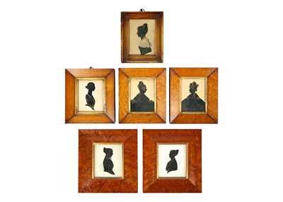 Lot 1431 - A pair of early Victorian gilt heightened silhouette portraits.