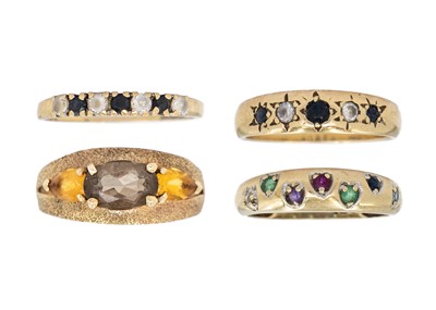 Lot 184 - A selection of four 9ct gem set rings.