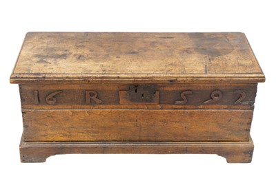 Lot 1655 - A small oak coffer.