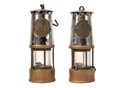 Lot 1400 - Two Brass and steel Protector Lamp & Lighting Co Eccles Miner's lamps