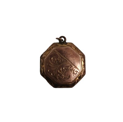 Lot 5 - An Edwardian 9ct gold octagonal front and back...