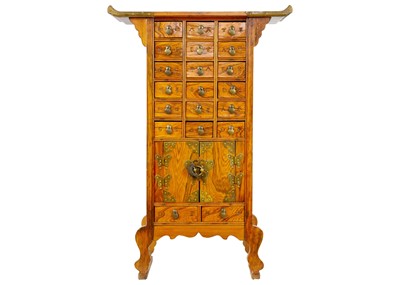 Lot 1 - A Chinese hardwood brass bound medicine cabinet, 20th century.