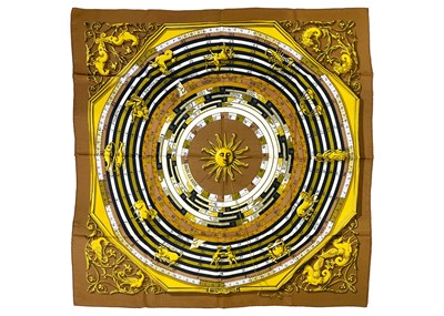 Lot 301 - HERMES - A silk scarf in 'Dies et Hore Astrologie' pattern designed by Francoise Faconnet.