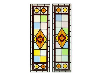 Lot 1033 - A pair of Victorian harlequin stained glass panels.